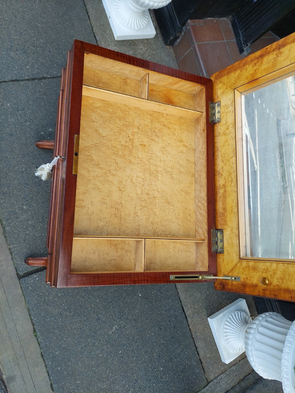 A late 19th-century mahogany sewing work table featuring a veneered rectangular top, turned support legs, a stretcher base, and a drop well. View V