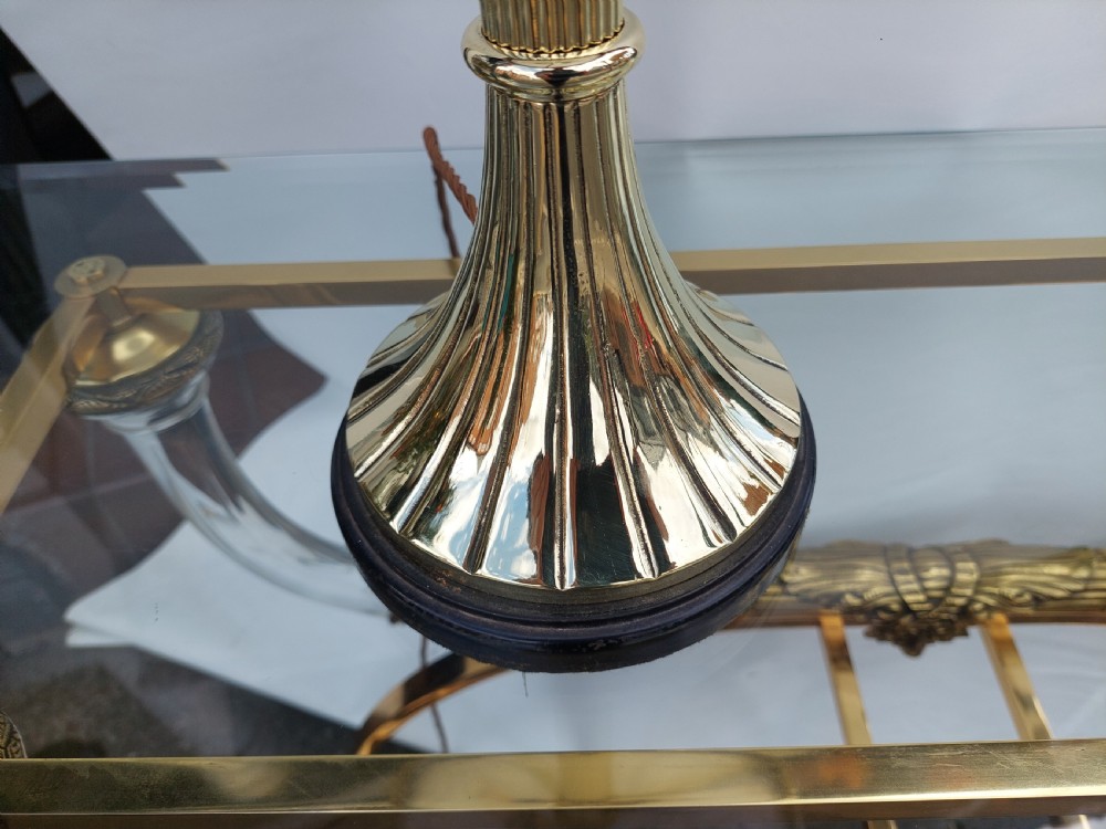 A late 19th-century Victorian brass table lamp featuring a fluted column, patterned brass rim gallery, and moulded white glass shade. View IV