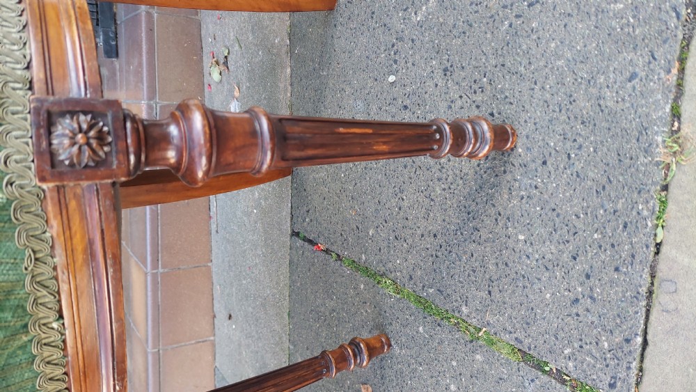 A pair of Victorian mahogany occasional chairs featuring fluted front legs and padded green velvet seats and backrests. View III