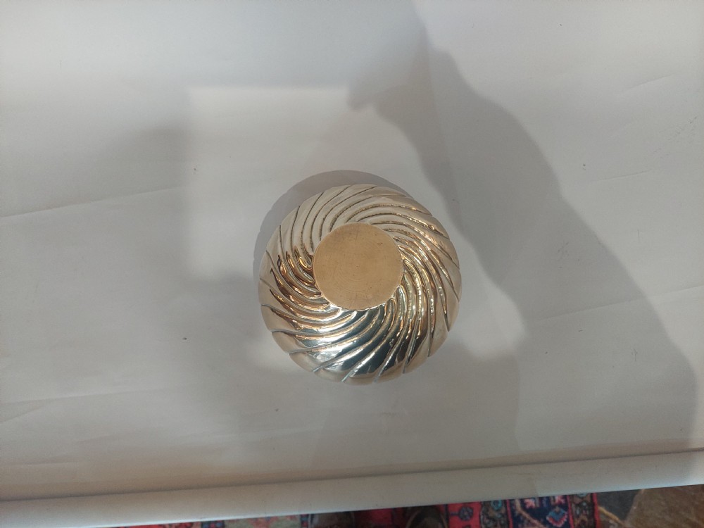 A polished brass Art Nouveau planter with swirling repousse lobed detailing and a beaded rim. View IV