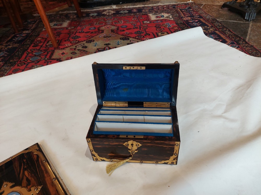 A Victorian coromandel wood desk set featuring a domed letter box and matching blotter book with ornate brass mounts and blue cameos. View VIII
