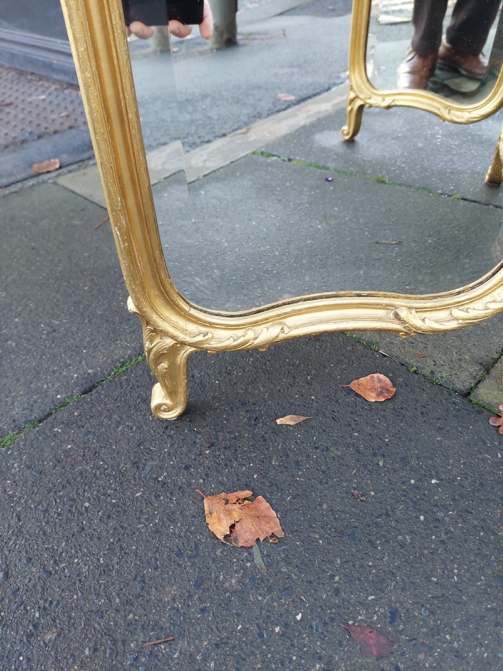 A three-panel folding triptych dressing table mirror featuring a gilded frame with Rococo carved cresting and bevelled glass. View IV