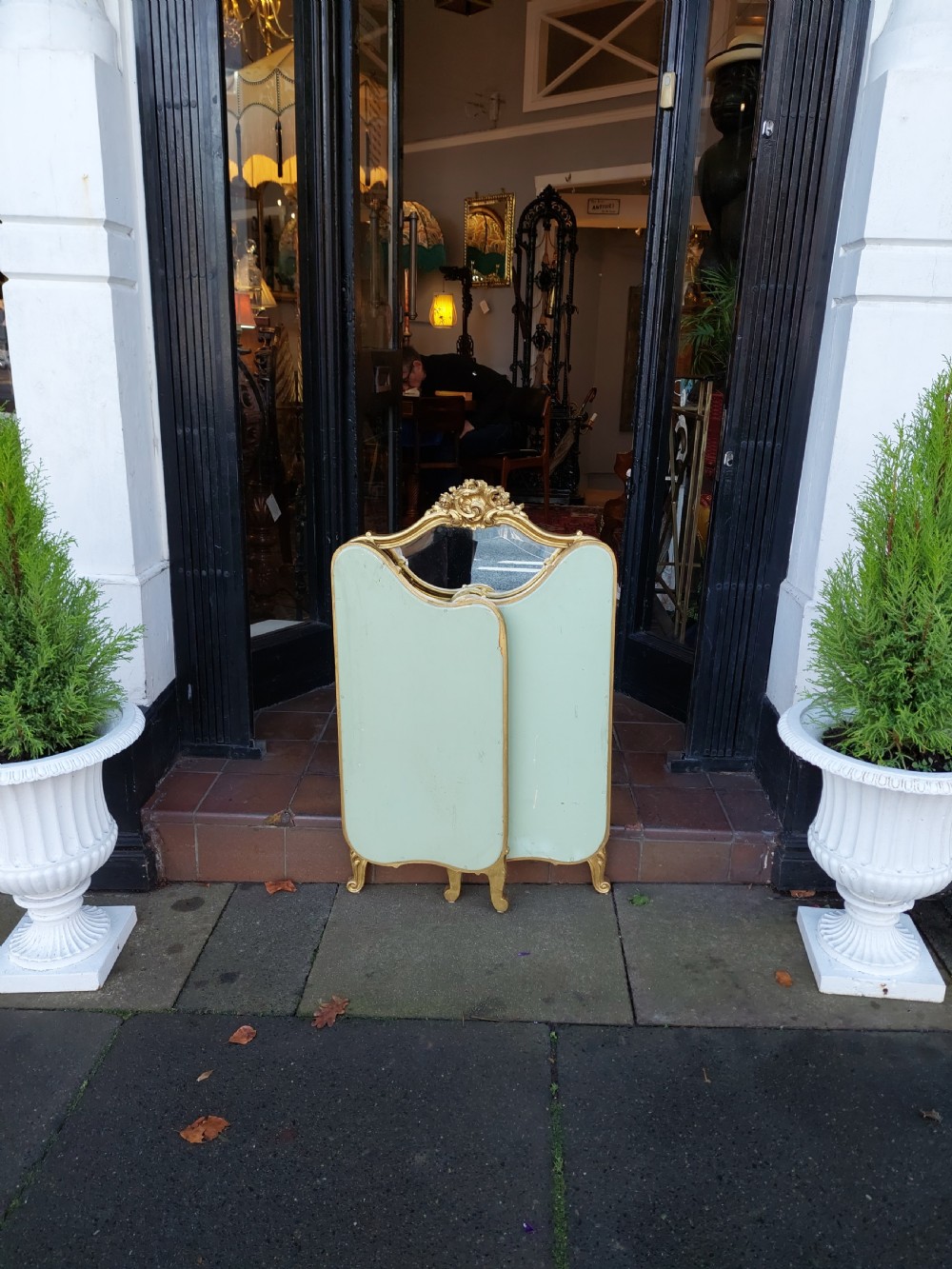 A three-panel folding triptych dressing table mirror featuring a gilded frame with Rococo carved cresting and bevelled glass. View XIII
