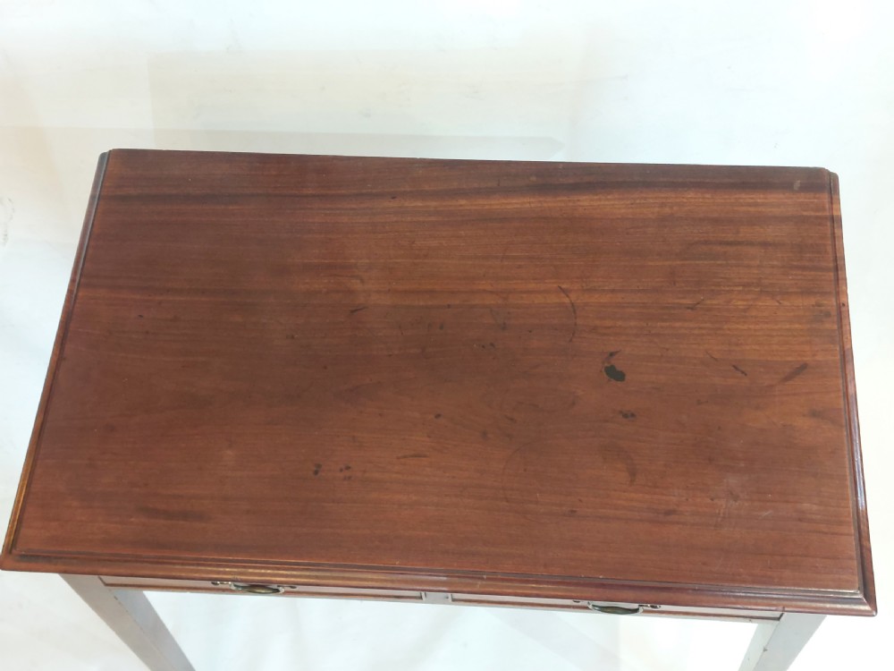 A mid-18th-century Georgian mahogany hall table featuring two drawer fronts with brass swan-neck handles and square tapered legs. View III