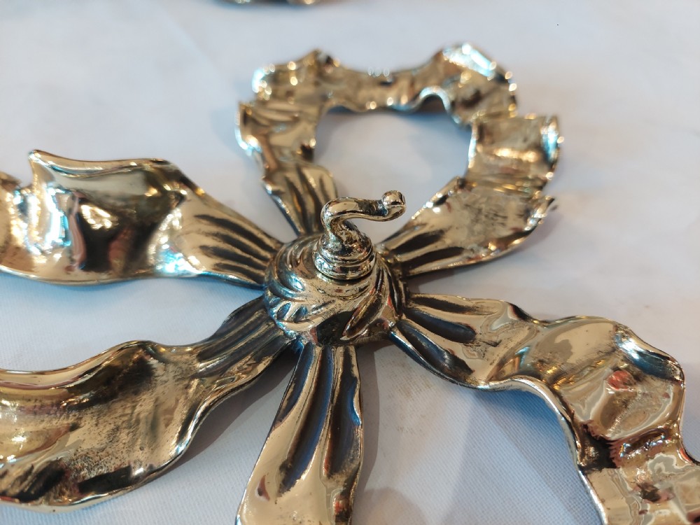 Set of 3 Ribbon Backed Early 20thC Brass Wall Hooks View V