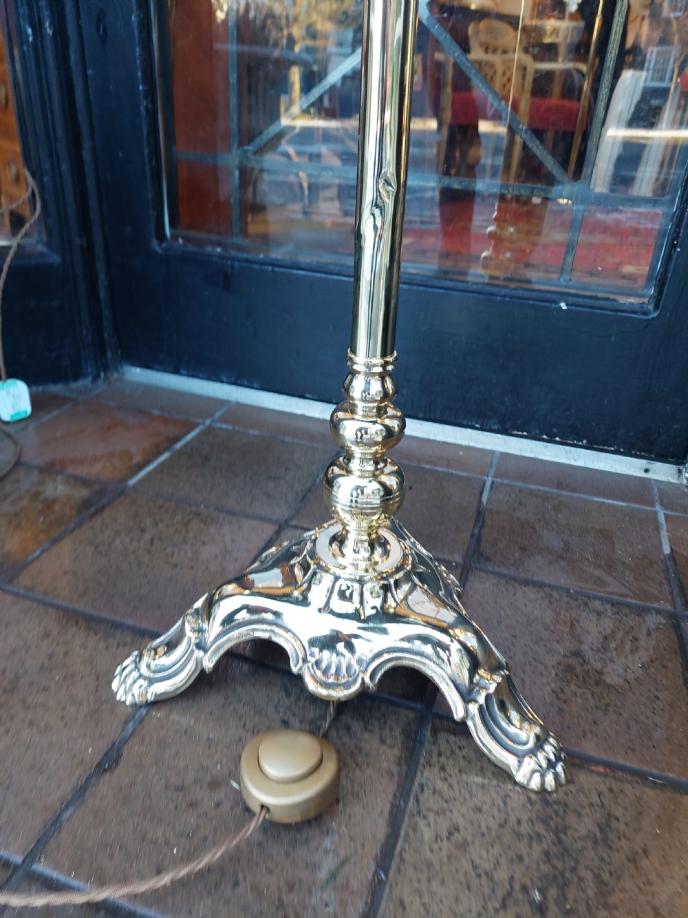 A tall silver-coloured metal standard lamp featuring a scrolled top arm, tripodal base, and a blue patterned fabric shade. View IV