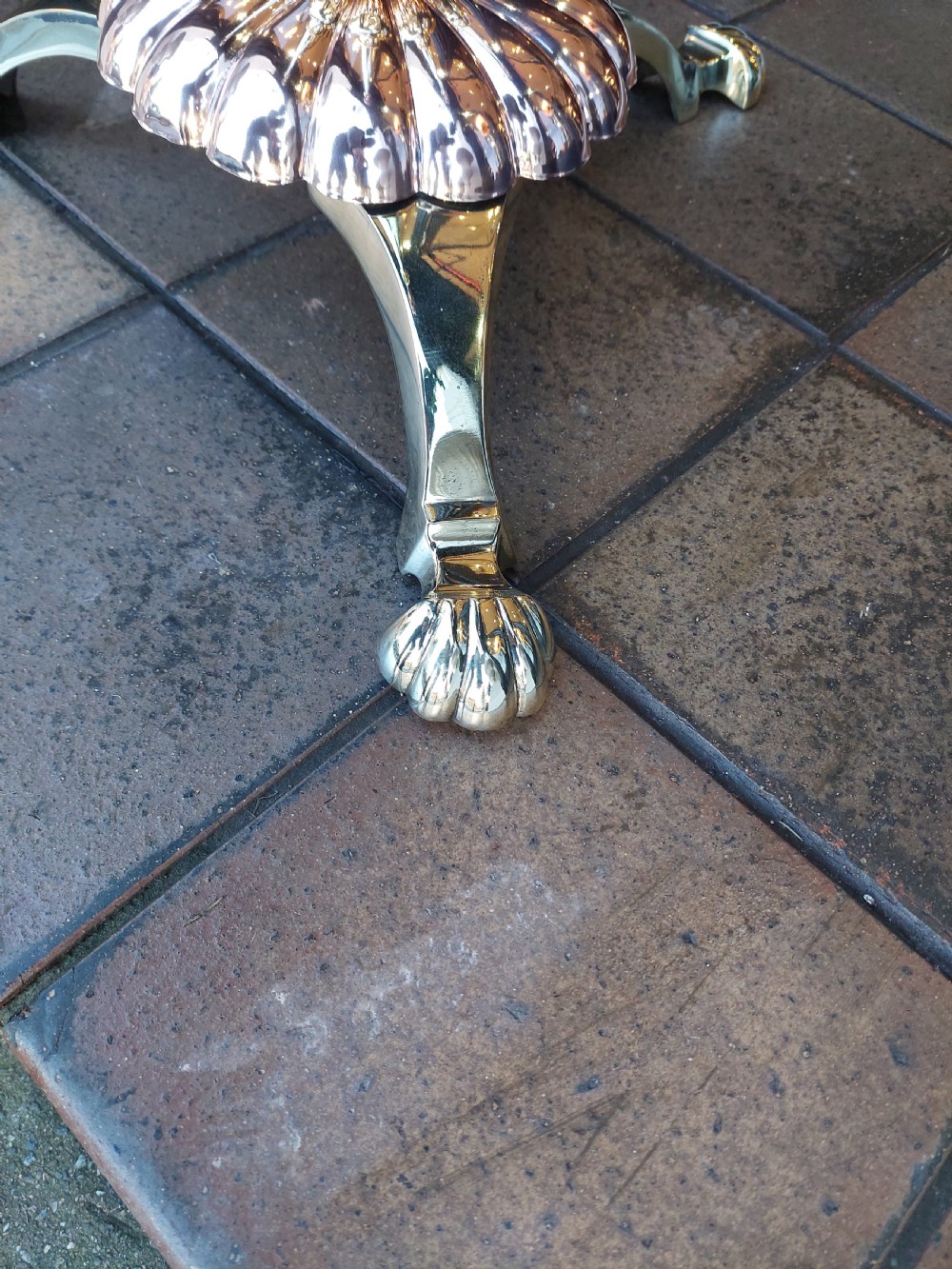 A late 19th-century brass and copper floor-standing oil lamp featuring claw feet and a cranberry glass font and shade. View III