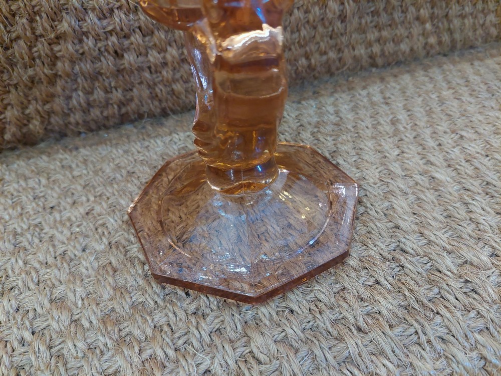A translucent pink pressed glass vase featuring a flared fluted top supported by a figural stem and a hexagonal base. View VIII