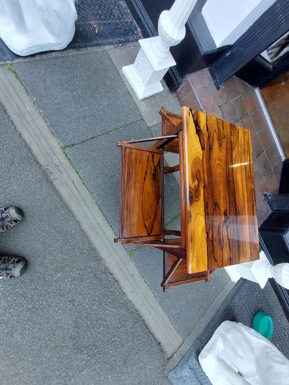 An Edwardian rosewood cake serving table featuring multiple drop-down folding side shelves and a polished rectangular top. View IV