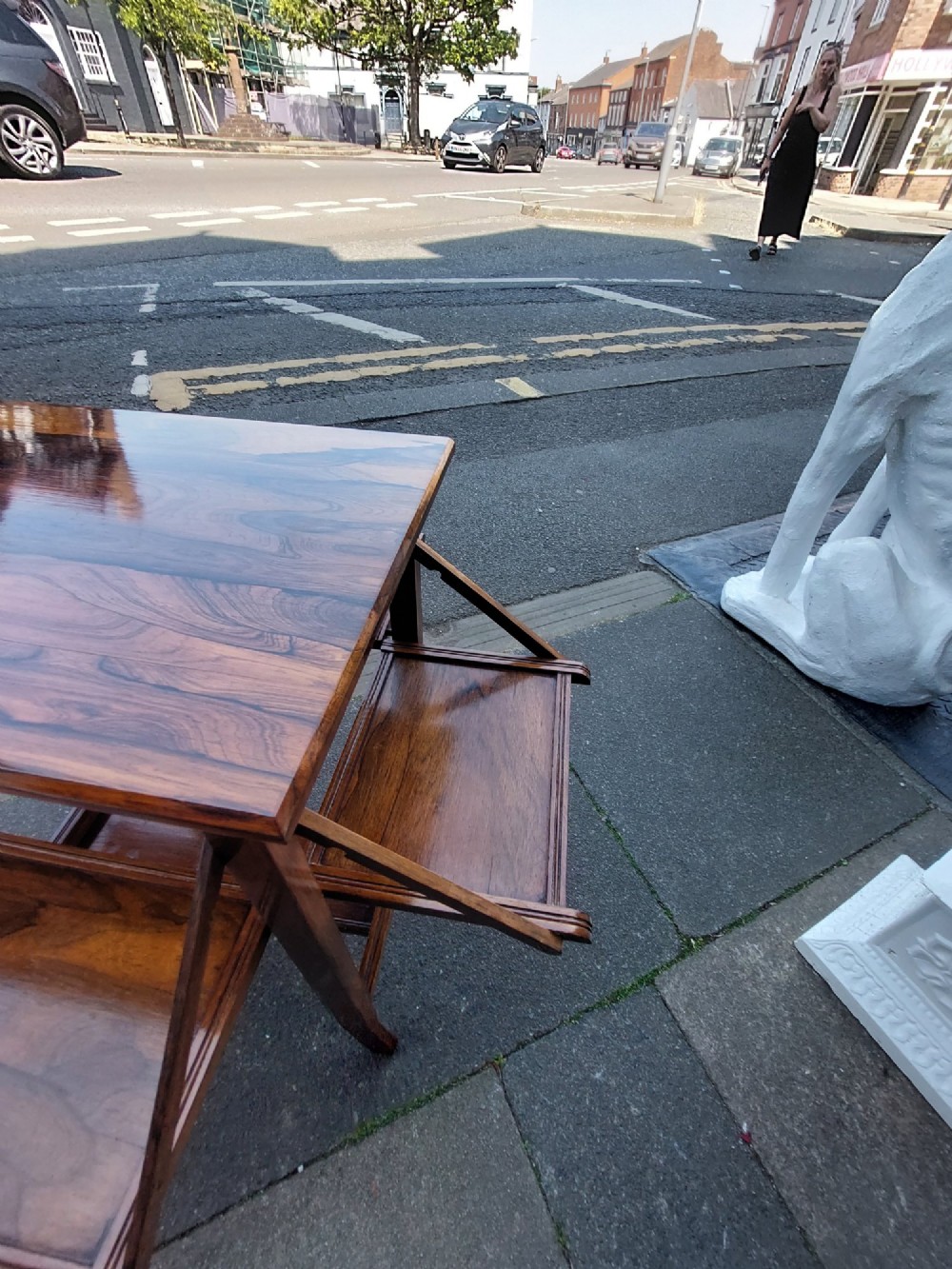 An Edwardian rosewood cake serving table featuring multiple drop-down folding side shelves and a polished rectangular top. View VII