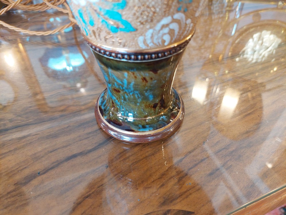 A pair of Royal Doulton Slaters Patent stoneware table lamps featuring patterned blue and gold ceramic bases paired with matching floral fringed fabric shades. View IV