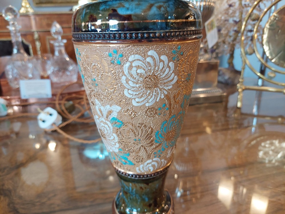 A pair of Royal Doulton Slaters Patent stoneware table lamps featuring patterned blue and gold ceramic bases paired with matching floral fringed fabric shades. View V