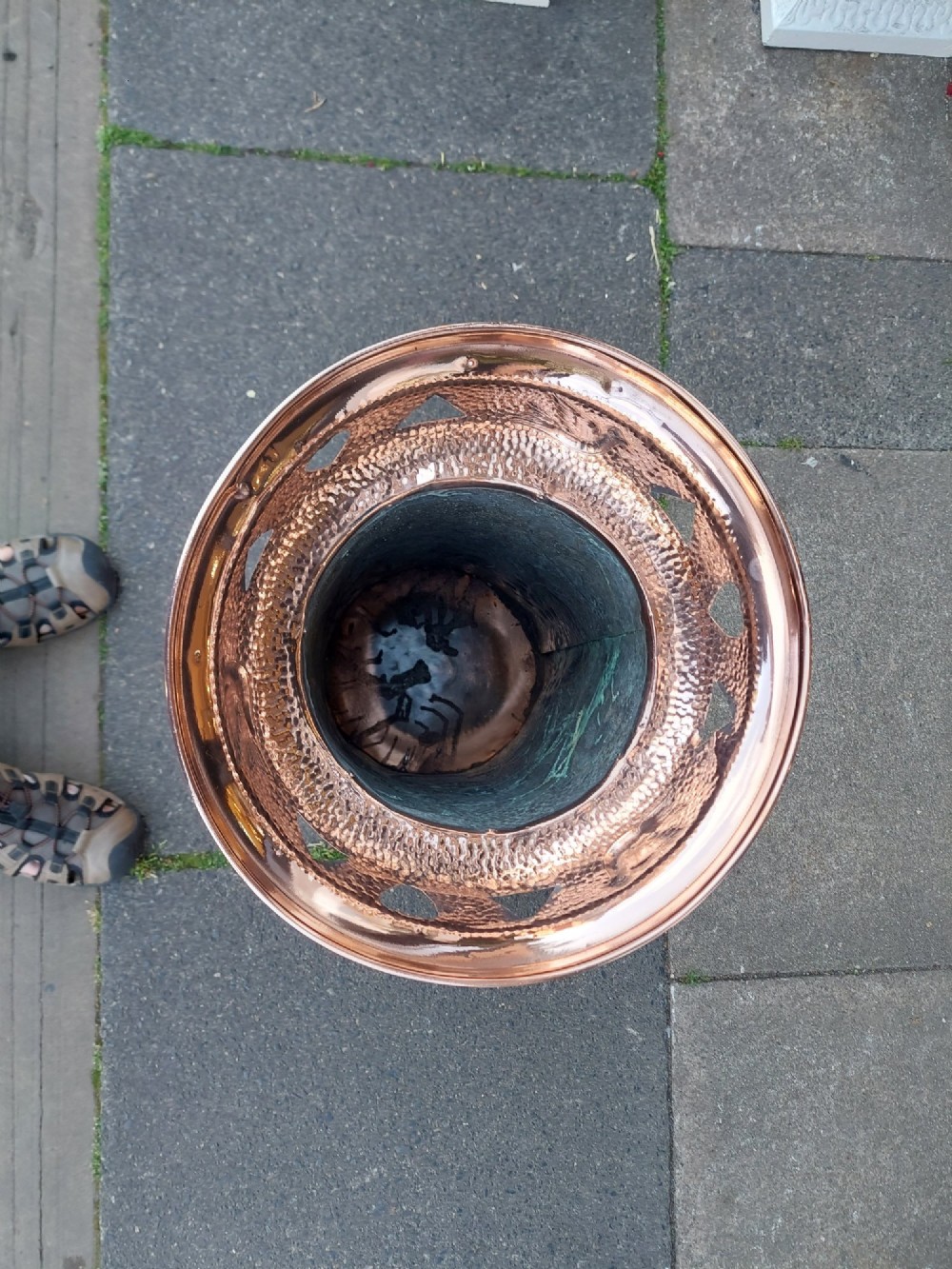 Cylindrical Art Nouveau copper umbrella stand with embossed organic relief motifs, a flared top rim, and a weighted base. View II