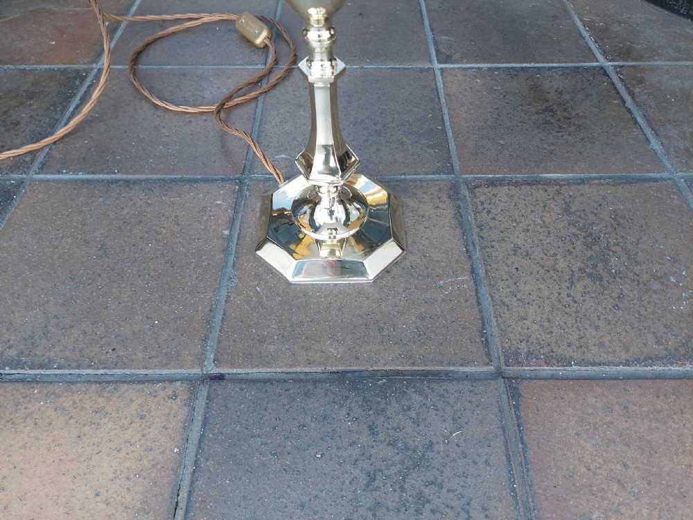 An Art Nouveau silvered brass table lamp featuring a hexagonal faceted stem and a white tapered shade printed with a pastoral scene. View IV