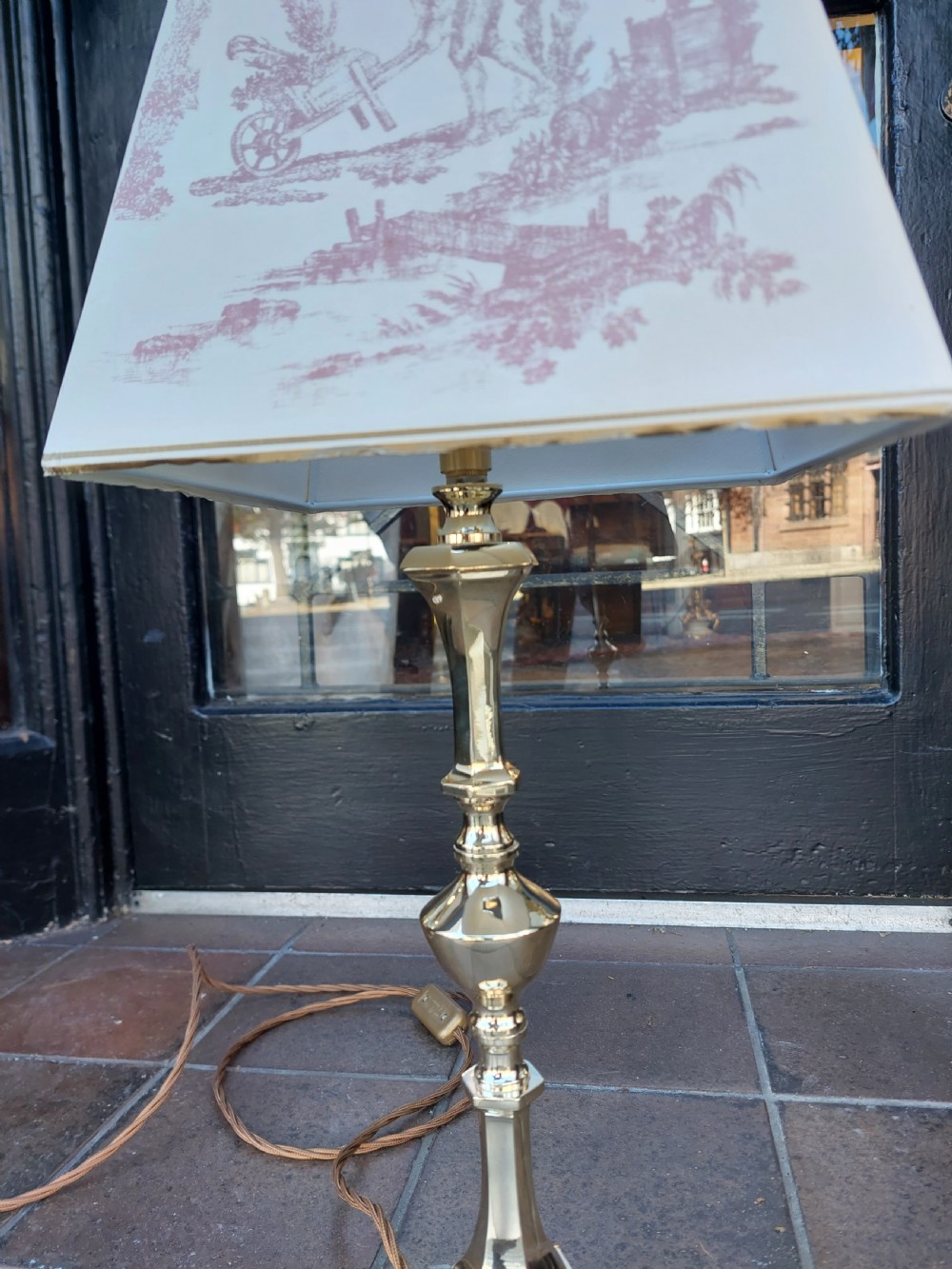 An Art Nouveau silvered brass table lamp featuring a hexagonal faceted stem and a white tapered shade printed with a pastoral scene. View VIII