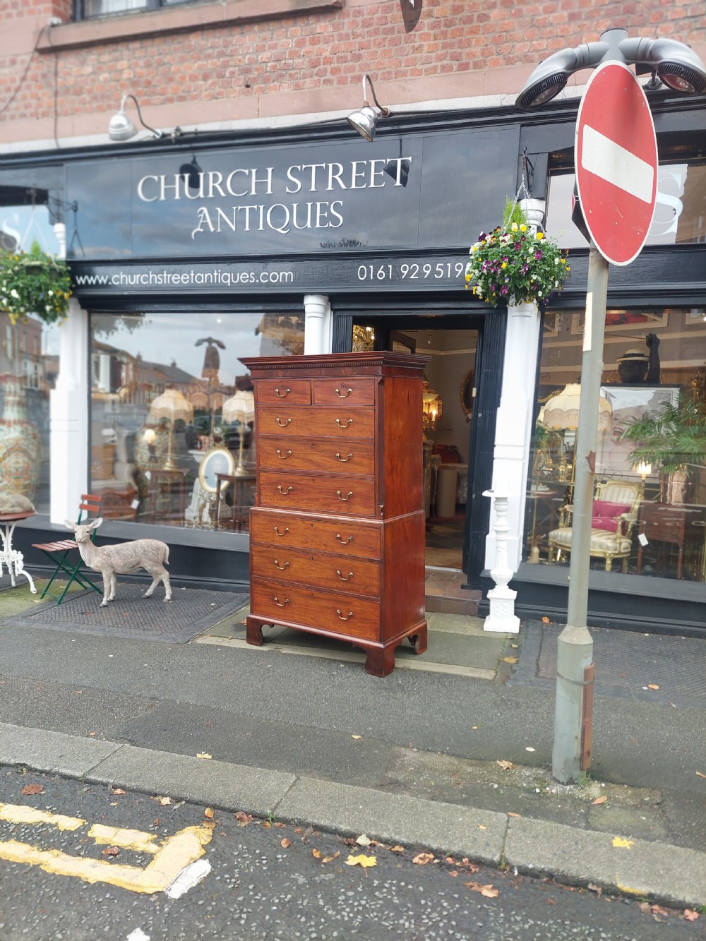 A late 18th-century Georgian mahogany tallboy chest on chest with brass swan-neck handles and bracket feet. View II
