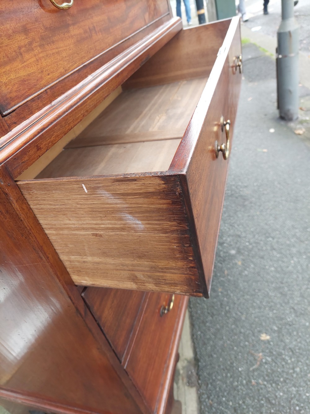 A late 18th-century Georgian mahogany tallboy chest on chest with brass swan-neck handles and bracket feet. View IV