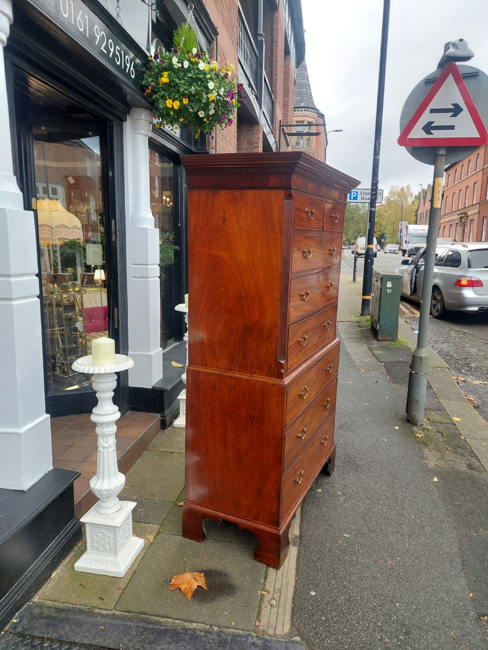 A late 18th-century Georgian mahogany tallboy chest on chest with brass swan-neck handles and bracket feet. View XI