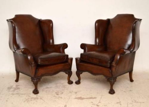 Pair of Antique Leather Wing Back Armchairs