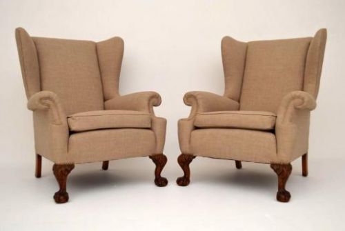 Pair of Antique Carved Mahogany Wing Back Armchairs