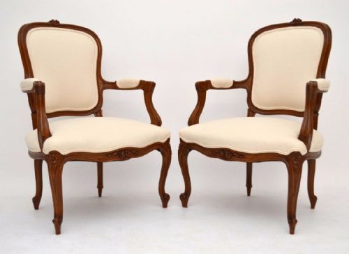 Pair of Antique French Carved Salon Cream Armchairs