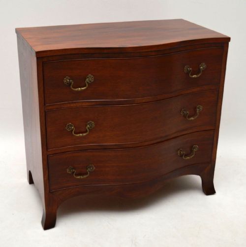 Pair of Antique Mahogany Serpentine Chests