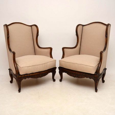 Pair of Antique Carved Walnut Wing Back Armchairs