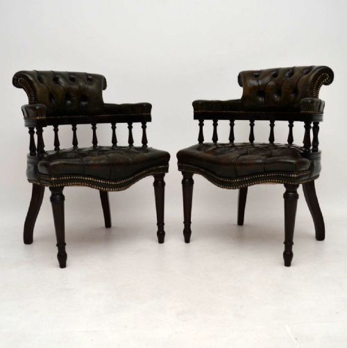 Pair of Antique Distressed Leather & Mahogany Armchairs