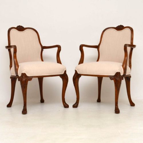 Pair of Antique Carved Walnut Upholstered Armchairs