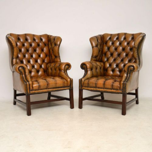 Pair of Antique Leather Wing Back Armchairs