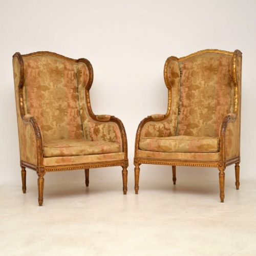 Pair of Antique Gilt Wood Wing Back Armchairs