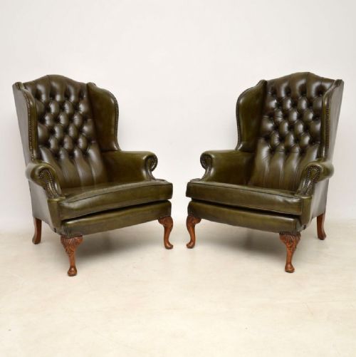 Pair of Antique Deep Buttoned Leather Wing Back Armchairs