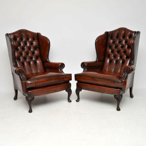 Pair of Antique Leather Wing Back Armchairs