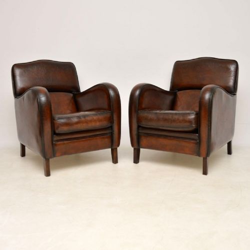Pair of Antique Distressed Leather Armchairs