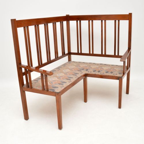 Antique Arts & Crafts Solid Walnut Corner Settee from Liberty of London