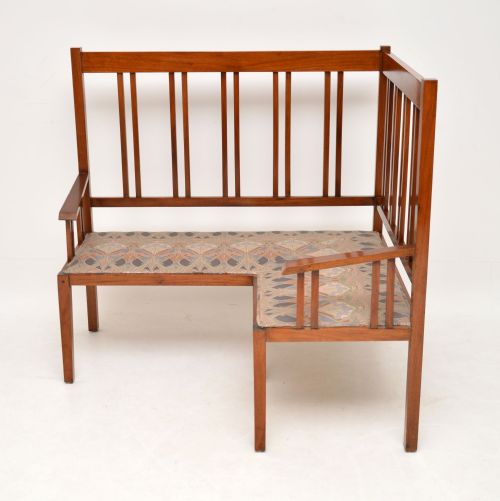 fig 1. Antique Arts & Crafts Solid Walnut Corner Settee from Liberty of London
