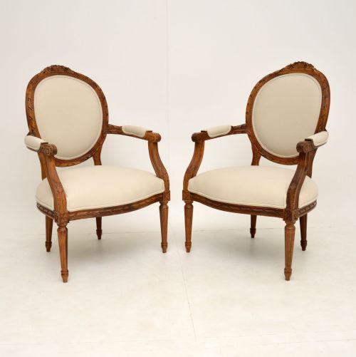 Pair of Antique French Walnut Salon Armchairs
