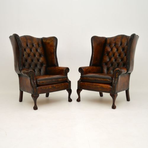 Pair of Antique Leather Wing Back Armchairs