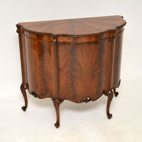 fig 1. Antique Mahogany Bow Front Cabinet by Maple & Co