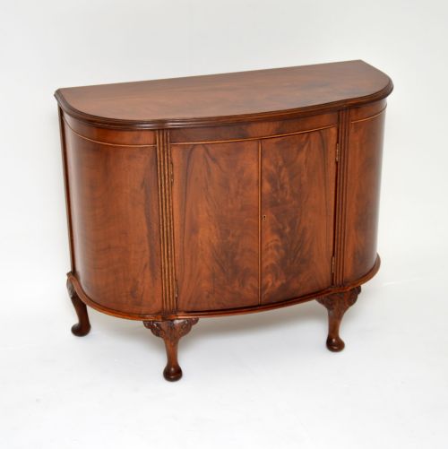 fig 1. Antique Walnut Bow Front Cabinet