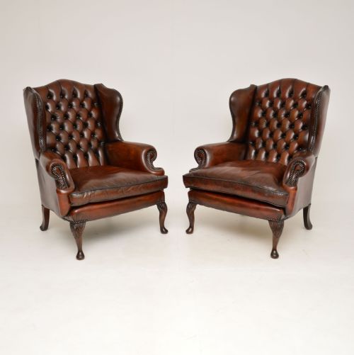 Pair of Antique Leather Wing Back Armchairs