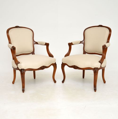 Pair of Antique French Walnut Salon Armchairs
