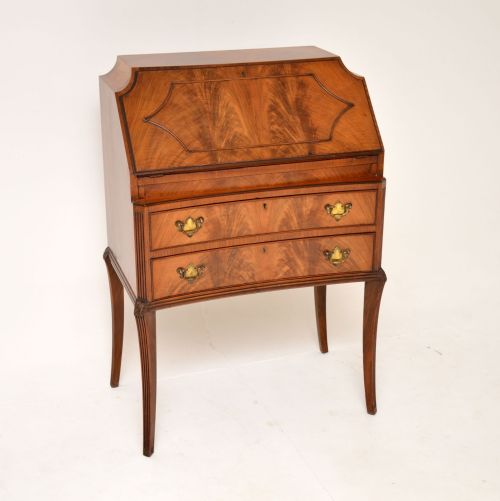 Antique Concave Shaped Mahogany Bureau on Sabre Legs