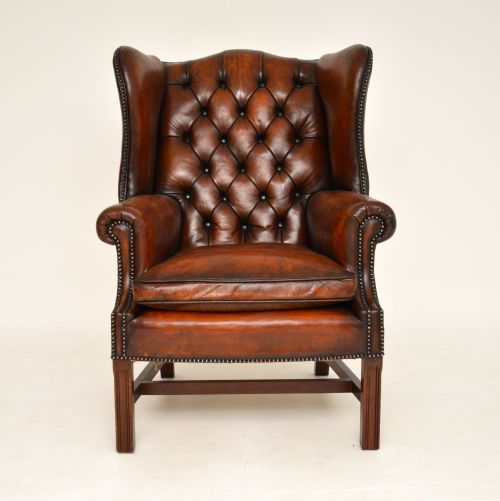 fig 1. Antique Deep Buttoned Leather Wing Back Armchair