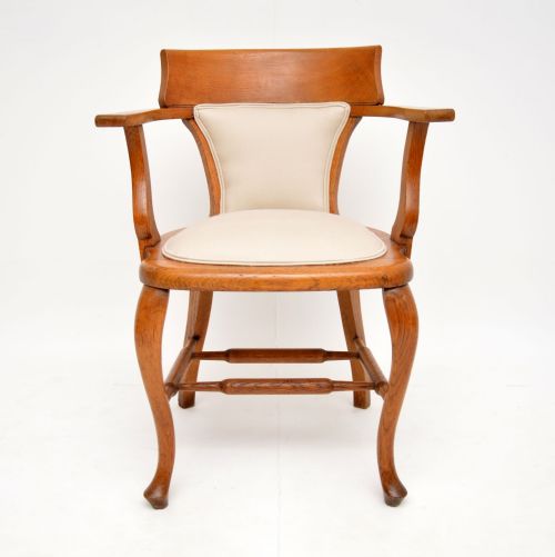 fig 1. Antique Golden Oak Captains Desk Chair
