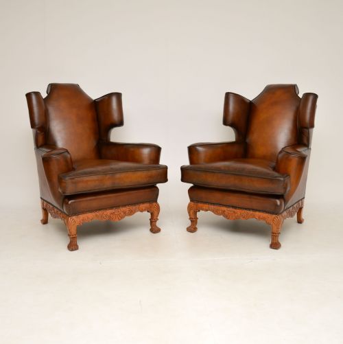 Pair of Antique Leather Wing Back Armchairs