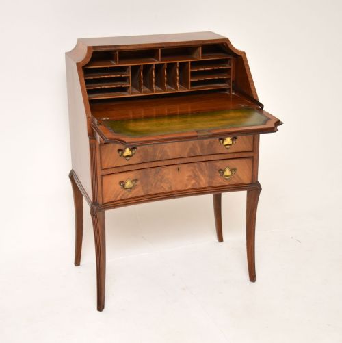 Antique Concave Shaped Mahogany Bureau on Sabre Legs
