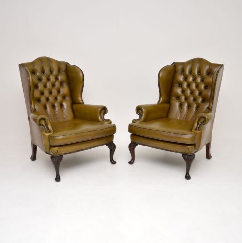 Pair of Antique Leather Wing Back Armchairs