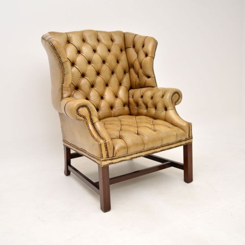 Antique Deep Buttoned Leather Wing Back Armchair
