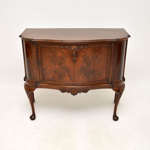 fig 1. Antique Mahogany Serpentine Cabinet